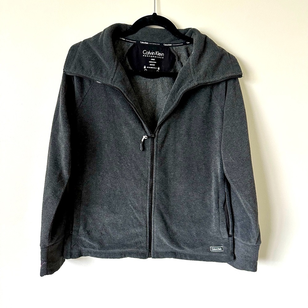 Calvin Klein women’s zip up headphone access and security pocket